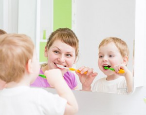 Mother and Son Brushing Teeth