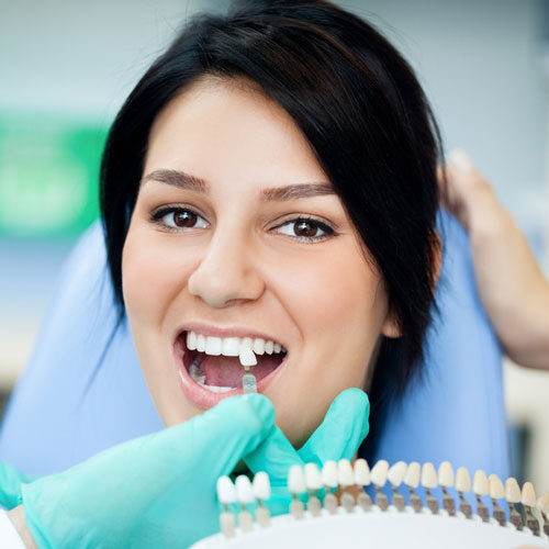 Dentist Matching Tooth Color